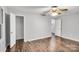 Bedroom with hardwood floors and walk-in closet at 27097 Cove Ln, Tega Cay, SC 29708