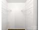 Large walk-in closet with wire shelving providing ample storage space at 27097 Cove Ln, Tega Cay, SC 29708