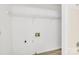 Laundry room with built-in shelving at 27097 Cove Ln, Tega Cay, SC 29708