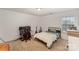 Bedroom with bed, desk, guitars, and a window at 3028 Apple Orchard Pl, Dallas, NC 28034