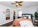 Bedroom with orange bedding and en-suite bathroom at 3474 Lake Wylie Dr, Rock Hill, SC 29732