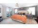Spacious main bedroom with lake view and access to a private deck and hot tub at 3474 Lake Wylie Dr, Rock Hill, SC 29732