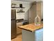 Kitchen with stainless steel appliances, open shelving, and a butcher block island at 3474 Lake Wylie Dr, Rock Hill, SC 29732