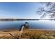 Serene lakefront view with private dock and gazebo at 3474 Lake Wylie Dr, Rock Hill, SC 29732