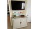 Cozy living room featuring a cabinet with art, a flat screen television, and a neutral color scheme at 3474 Lake Wylie Dr, Rock Hill, SC 29732