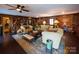 Cozy living room with built-in shelving and hardwood floors at 3474 Lake Wylie Dr, Rock Hill, SC 29732
