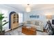 Home office with light-colored sofa and wood accents at 3474 Lake Wylie Dr, Rock Hill, SC 29732