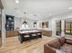 Modern kitchen with an island, white quartz countertops, and wooden cabinetry at 4039 Abingdon Rd, Charlotte, NC 28211