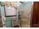 Bathroom with shower stall and linen storage at 4816 Zion Church Rd, Concord, NC 28025