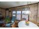 Cozy dining area with rocking chairs and view of backyard at 4816 Zion Church Rd, Concord, NC 28025