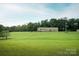 Spacious home on a large grassy lot with mature trees and scenic views at 4816 Zion Church Rd, Concord, NC 28025