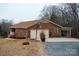 Brick ranch house with attached garage and basketball court at 4816 Zion Church Rd, Concord, NC 28025