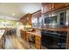 Kitchen with built-in desk and stainless steel appliances at 4816 Zion Church Rd, Concord, NC 28025