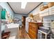 Bright laundry room with shelving and a utility sink at 4816 Zion Church Rd, Concord, NC 28025