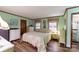 Main bedroom with floral bedding and ample closet space at 4816 Zion Church Rd, Concord, NC 28025