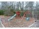 Wooden playset with slide and swings in backyard at 4816 Zion Church Rd, Concord, NC 28025