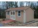 Tan colored workshop with double doors at 4816 Zion Church Rd, Concord, NC 28025