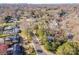An aerial perspective captures the neighborhood, showcasing tree-lined streets and neighborhood at 4833 Addison Dr, Charlotte, NC 28211