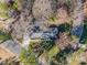 An aerial perspective showcases the property nestled among trees at 4833 Addison Dr, Charlotte, NC 28211