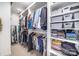 Organized walk-in closet with shelving, hanging rods, and ample storage space for clothing and accessories at 4833 Addison Dr, Charlotte, NC 28211