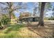 Backyard with a sitting and dining area, a grill, and a big yard at 4833 Addison Dr, Charlotte, NC 28211