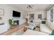 Cozy living room featuring a fireplace, comfortable sectional sofa, and modern decor for relaxation at 4833 Addison Dr, Charlotte, NC 28211