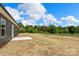 Expansive backyard featuring a concrete patio, perfect for outdoor entertaining and enjoying the peaceful surroundings at 5177 Flay Rd, Lincolnton, NC 28021