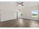 Large primary bedroom featuring wood-look flooring, natural light, and neutral walls at 5177 Flay Rd, Lincolnton, NC 28021