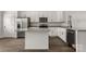 Spacious eat in kitchen with stainless steel appliances, granite countertops, hardwood floors, and large island perfect for Gathering gatherings at 5177 Flay Rd, Lincolnton, NC 28021