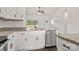 Beautiful kitchen with stainless dishwasher, granite counters, and a modern faucet at 5177 Flay Rd, Lincolnton, NC 28021