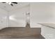 Open-concept living room featuring wood-look floors and bright, neutral walls at 5177 Flay Rd, Lincolnton, NC 28021
