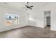 Open-plan living area with lots of natural light and high ceilings at 5177 Flay Rd, Lincolnton, NC 28021