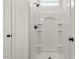 Bright shower with an integrated shelf design and modern fixtures at 5177 Flay Rd, Lincolnton, NC 28021