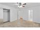 Bedroom with neutral carpet, ceiling fan, and closet at 5929 Quail Hollow Rd # B, Charlotte, NC 28210