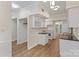 Bright kitchen with white cabinets, granite countertops, and modern appliances at 5929 Quail Hollow Rd # B, Charlotte, NC 28210