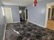 Dining area with dark-tiled floor and access to other rooms at 605 E Horah St, Salisbury, NC 28144