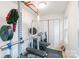 Well-equipped home gym with weightlifting equipment, including a squat rack, bench, and weights for fitness enthusiasts at 65 Franklin St, Wadesboro, NC 28170