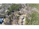 Aerial view showcasing the house and surrounding woods at 665 Edwards Rd, Fort Lawn, SC 29714