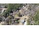 Aerial view of property showing its location in a wooded area at 665 Edwards Rd, Fort Lawn, SC 29714