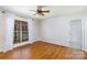 Hardwood floor bedroom with window and access to bathroom at 665 Edwards Rd, Fort Lawn, SC 29714