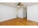 Hardwood bedroom with access to bathroom and closets at 665 Edwards Rd, Fort Lawn, SC 29714