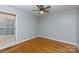 Spacious bedroom featuring hardwood floors and large window at 665 Edwards Rd, Fort Lawn, SC 29714