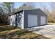 Gray metal detached garage with double doors at 665 Edwards Rd, Fort Lawn, SC 29714