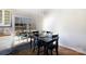 Kitchen dining area with black table and access to patio at 665 Edwards Rd, Fort Lawn, SC 29714