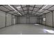 Spacious garage interior with double doors and high ceilings at 665 Edwards Rd, Fort Lawn, SC 29714