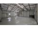 Bright and spacious garage interior with high ceilings at 665 Edwards Rd, Fort Lawn, SC 29714