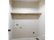 Laundry area with wood shelving and hookups at 665 Edwards Rd, Fort Lawn, SC 29714
