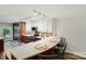Bright kitchen featuring stainless steel appliances, hardwood floors, and a breakfast bar with barstool seating at 9108 Nolley Ct # B, Charlotte, NC 28270