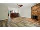 Inviting living room showcasing wood-look floors, open layout, and seamless flow to the kitchen at 9108 Nolley Ct # B, Charlotte, NC 28270