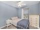 Comfortable bedroom with soft light, ceiling fan, and dresser at 101 Arbridge Ct, Mount Holly, NC 28120